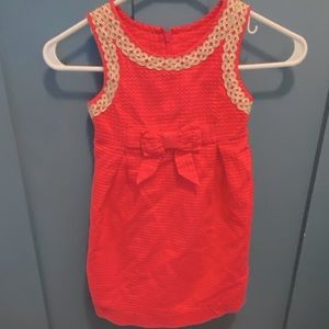 Lily pink dress with embellished collar.